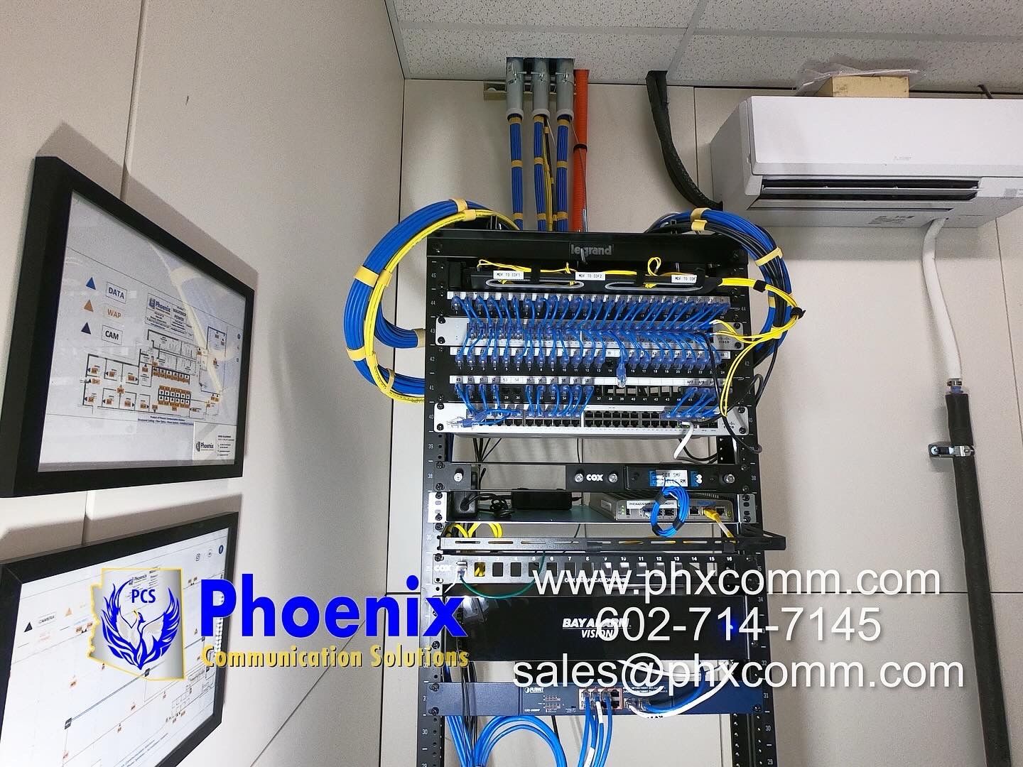 Organized network cabling and patch panel installation for commercial low-voltage systems.