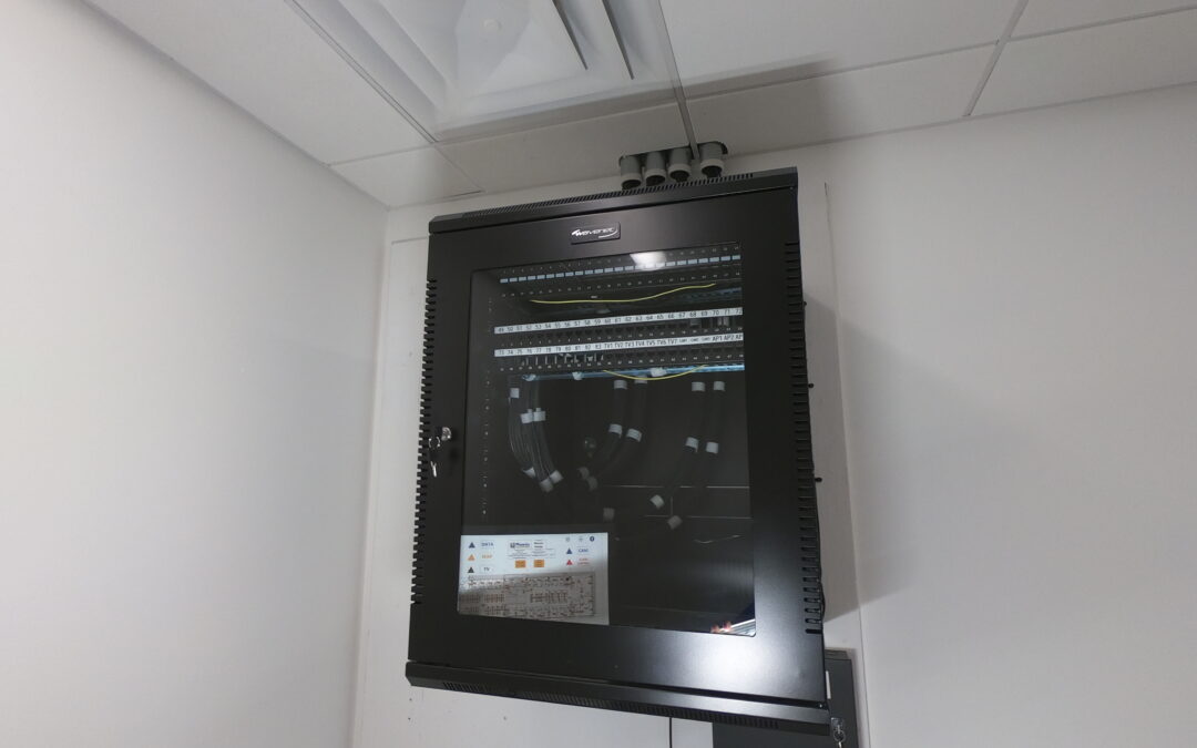 MDF buildout with Category 6 cable runs and network connections in office space.