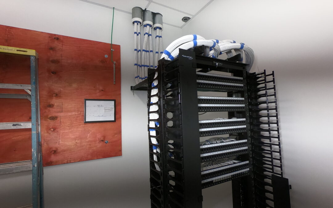 Structured cabling installation with MDF buildout and network cable runs.